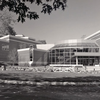 A black and white photo of the entrance to the Fine Arts Center