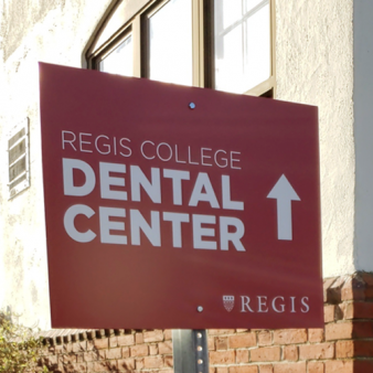 Regis College Dental Center sign