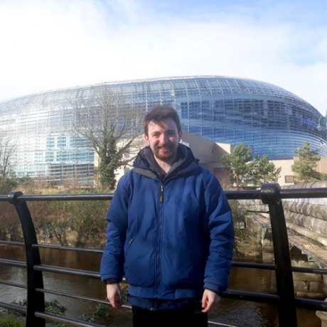 Conor Breen '21 poses in front of the dome of Aviva Stadium in Dublin