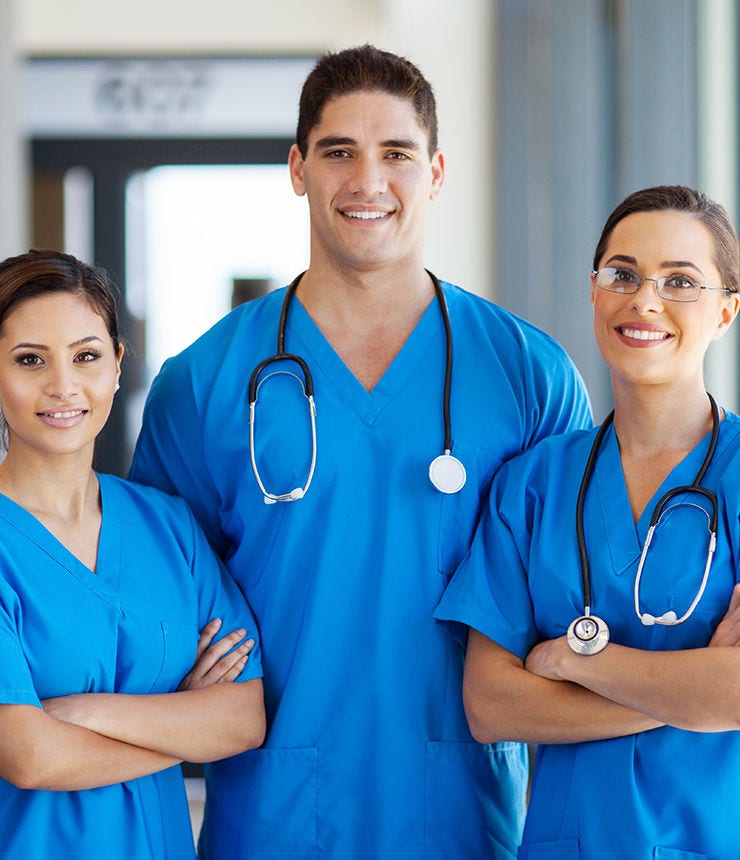 group of young hospital workers in scrubs; Shutterstock ID 115143340; purchase_order: -; job: -; client: -; other: -
