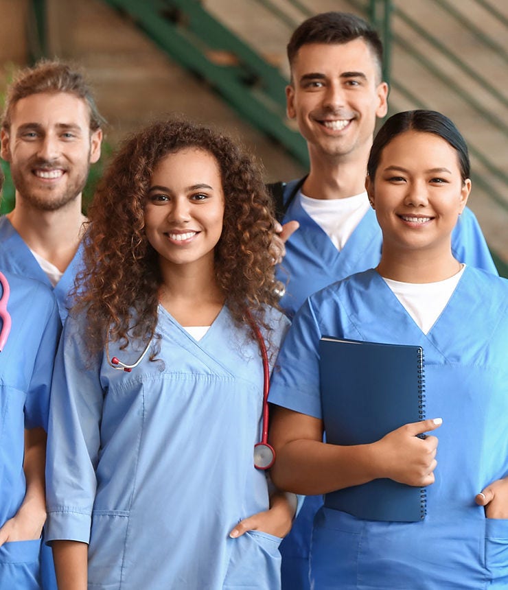 Group of students in hall of modern clinic; Shutterstock ID 2170553087; purchase_order: -; job: -; client: -; other: -