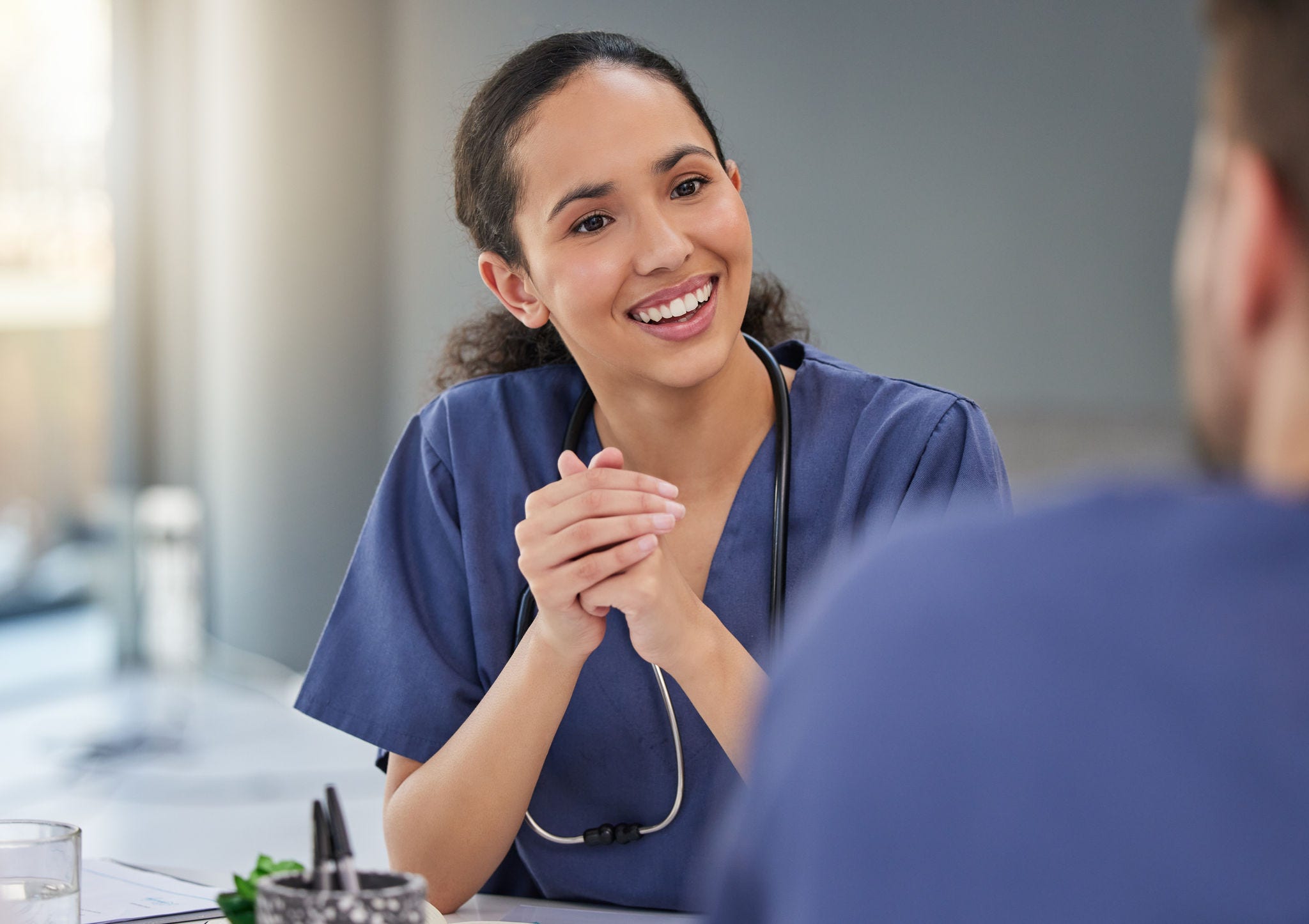 Nurse, happy woman and meeting healthcare team for hospital management, medicine and leadership discussion. Female doctor, smile and talking to employees in collaboration, clinic and surgery planning; Shutterstock ID 2274925025; purchase_order: -; job: -; client: -; other: -