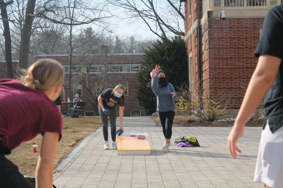 Students playing games in front of St. Joseph Hall on the Weston campus