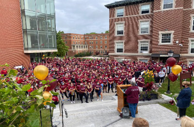 The Regis community gathers at the steps of the Learning Commons for Founder's Day 2021