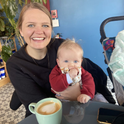 Beth Bunnell and child enjoy a coffee