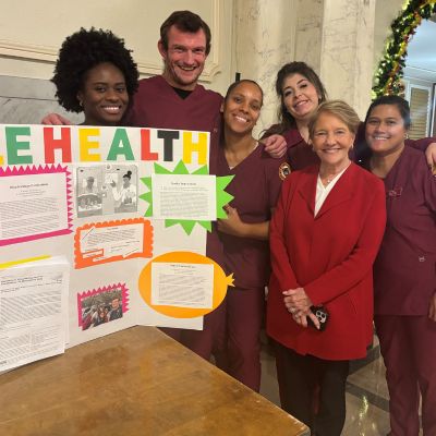 President Hays with ASN Students at Poster Presentation