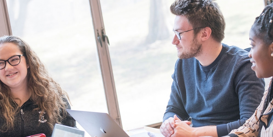 Regis College students in Library