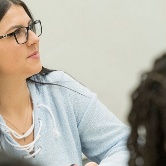 Regis College student in class