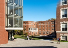 Regis College students outside in quad