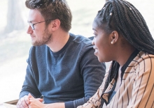 Two students in Regis College Library